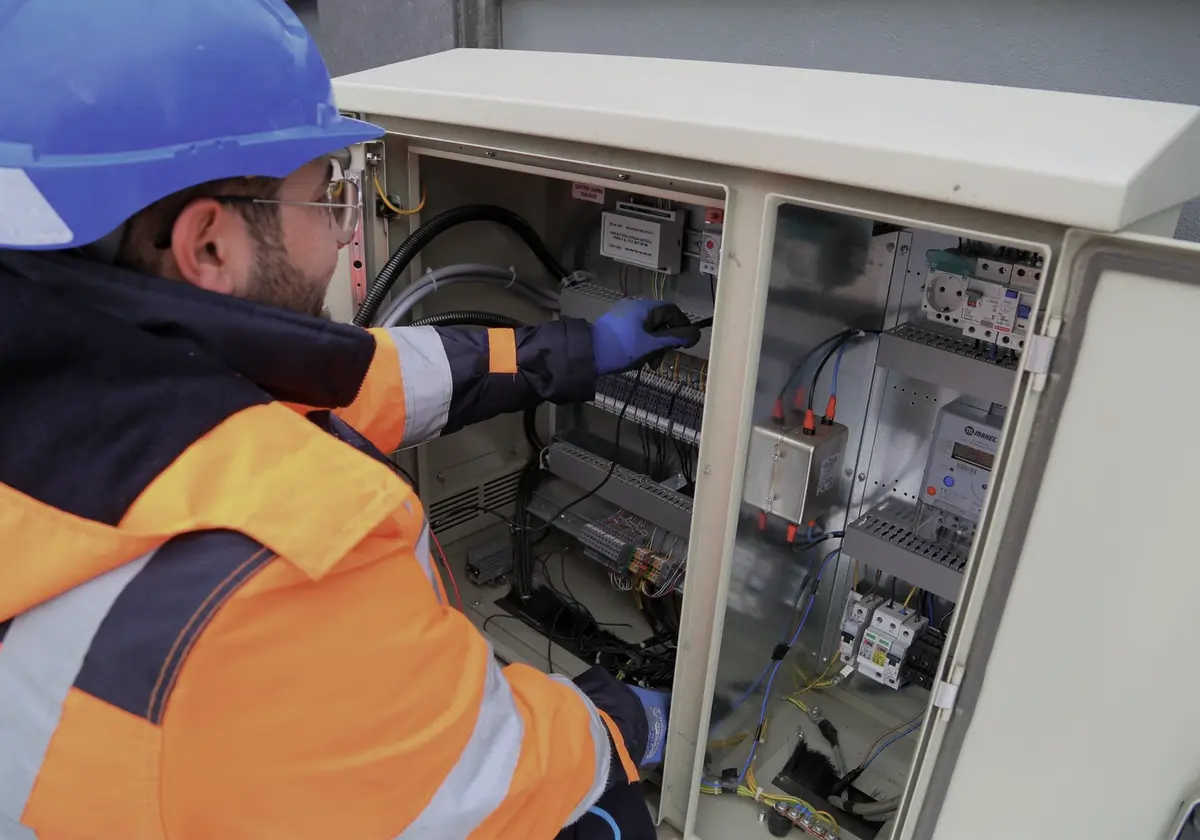 Technician servicing an installed system
